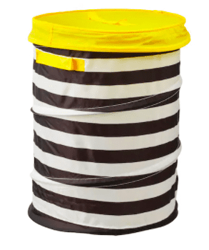 Caja de pañuelos a rayas blancas y negras con parte superior amarilla